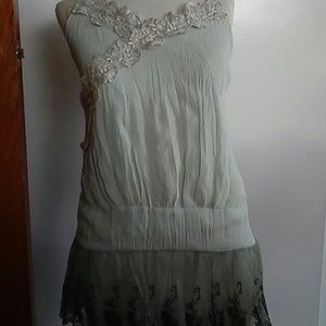 Very nice dressy tank top. Sheer multi color.